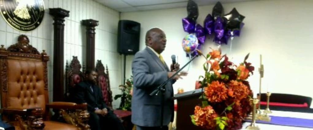 Pastor Leroy Grogen preaching
